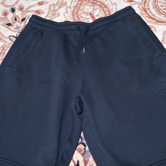 Puma black sweatpants shorts with front pockets, size medium - Picture 2 of 8